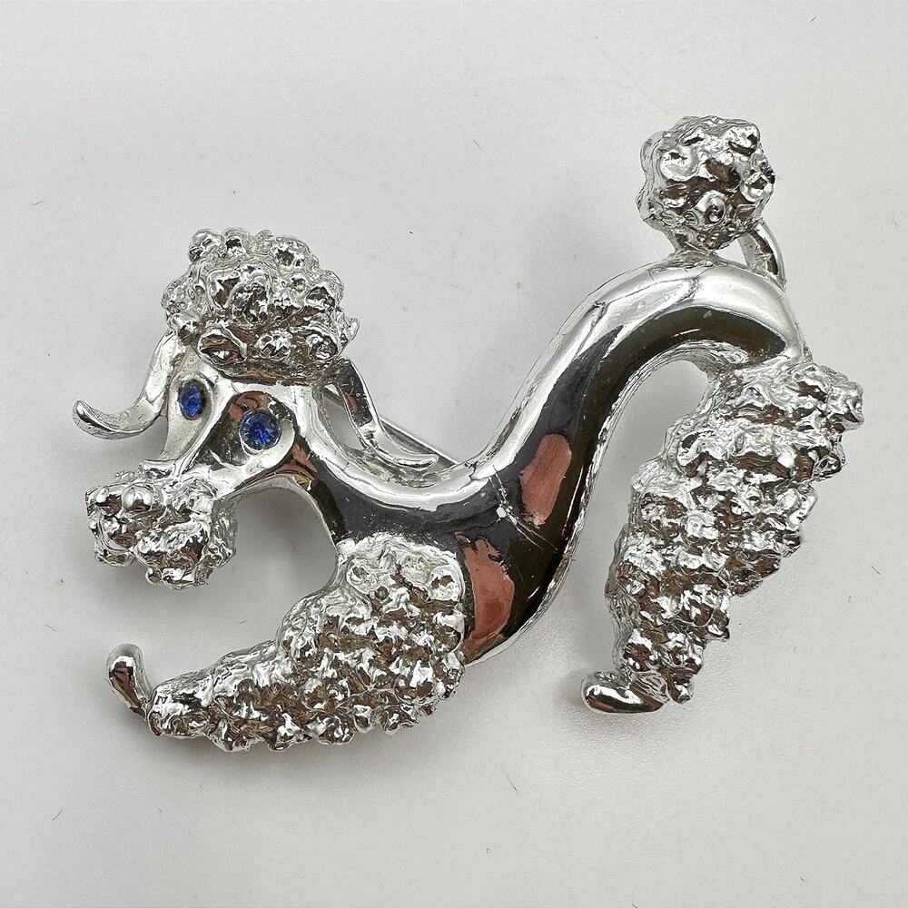 Vintage 60s Mid-Century Silver Tone Poodle Dog Brooch Blue Glass Eyes Textured